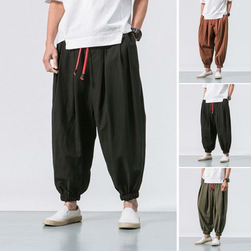 Celana Harem Streetwear pria, celana olahraga warna polos pinggang elastis longgar tali serut Hip Hop bersaku Streetwear musim panas
