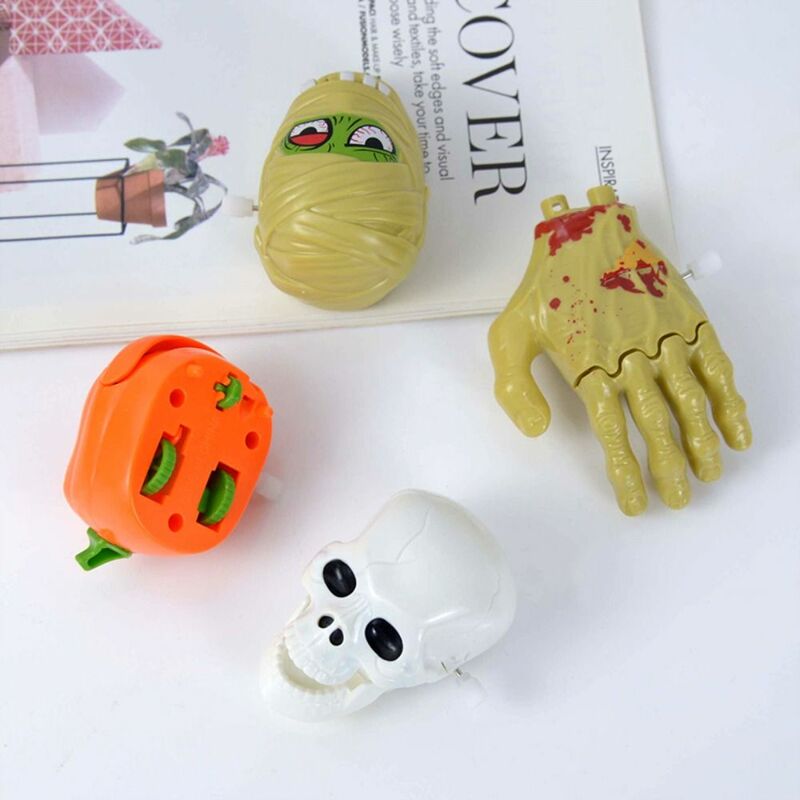 Juguete de mecanismo de relojería de calabaza para Halloween, juguete de cuerda de mano rota realista