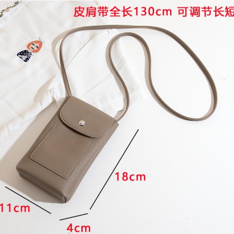 Tas selempang wanita mode baru 2024 tas telepon kulit lembut tali bahu dapat disesuaikan tas selempang kecil warna polos
