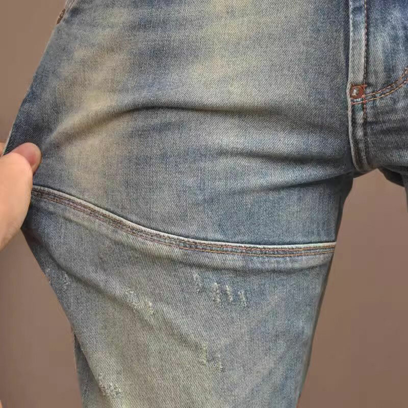 Jeans da uomo di alta moda di strada retrò lavati blu elastici Slim Fit impiombati Jeans da motociclista Homme pantaloni di Jeans Hip Hop firmati Vintage