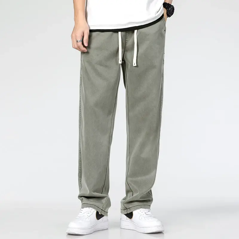 Mężczyźni wiosna lato cienkie spodnie typu Casual elastyczny modny Lyocell dżinsy luźne zielone spodnie wojskowe duże rozmiary