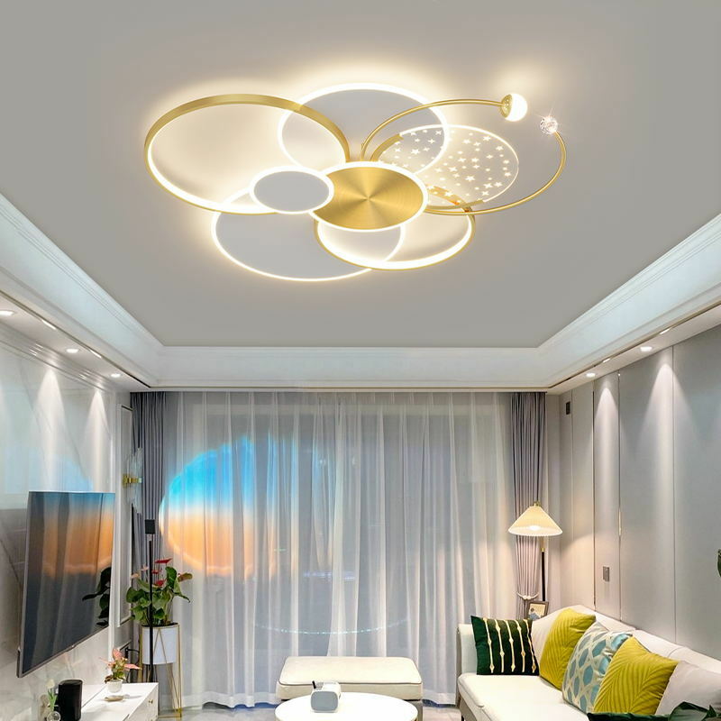 Plafonnier Led circulaire doré composé d'étoiles, design moderne simpliste, montage en surface sur panneau, idéal pour un salon ou une chambre à coucher