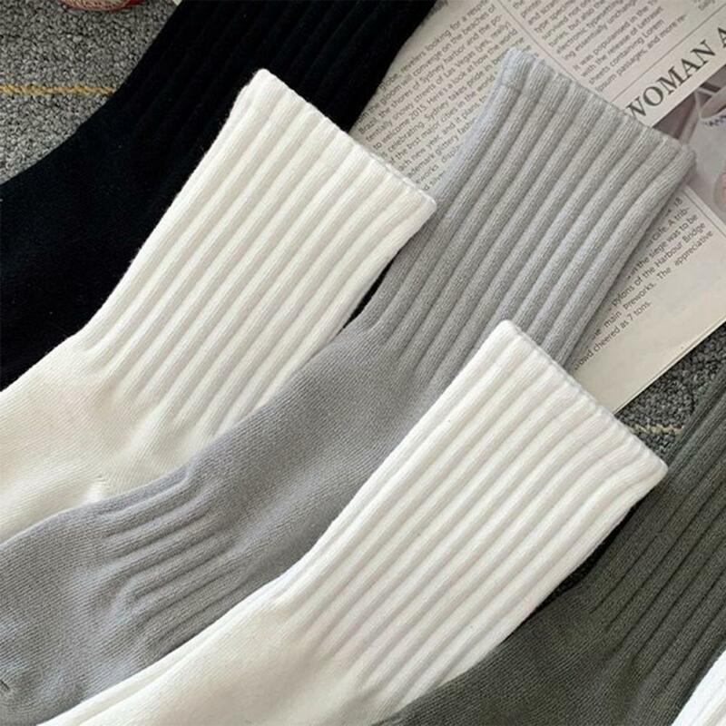 Kaus kaki tabung tengah untuk pria wanita warna Solid putih dan hitam Streetwear Harajuku modis bernapas dan kasual bisnis