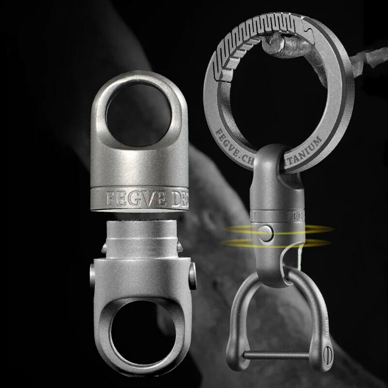 Nuovo portachiavi a sgancio rapido con aspirazione magnetica in lega di titanio gli uomini possono ruotare la fibbia Push Pull con portachiavi per auto a 360 °
