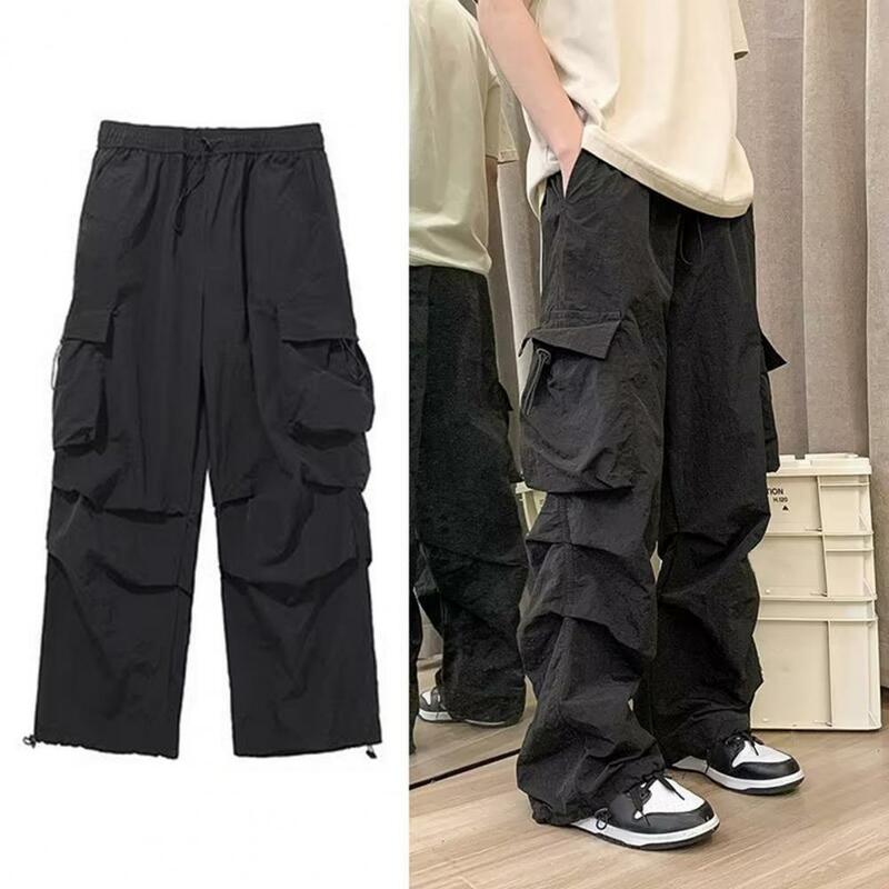 Pantalones Cargo con múltiples bolsillos para hombre, pantalones de trabajo con estilo, ajuste suelto, cintura elástica, ropa de calle a la moda para la cadera