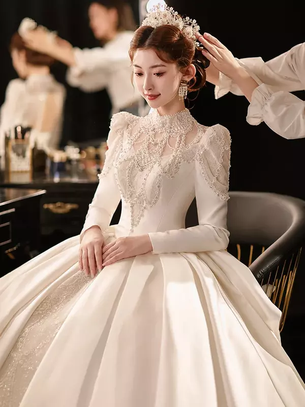 Suknia ślubna z długimi rękawami nowa panna młoda francuska Retro styl dworski satynowa sukienka główna duży ogon