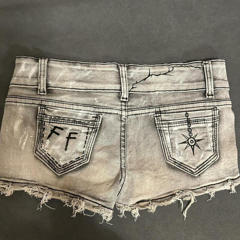 Letnie ubrania damskie dopasowane z rozerwanymi dziurami odkryte kieszenie frędzle nieobszyte brzegi nostalgiczne kolorowe jeansowe szorty sexy spodnie z niskim stanem