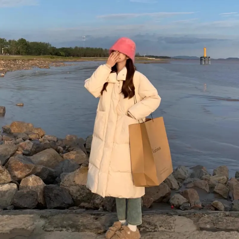 Bawełniana kurtka z piór kobiety w długim odcinku luźna moda uniwersalna odzież chlebowa bawełniana kurtka zimowa płaszcz damski