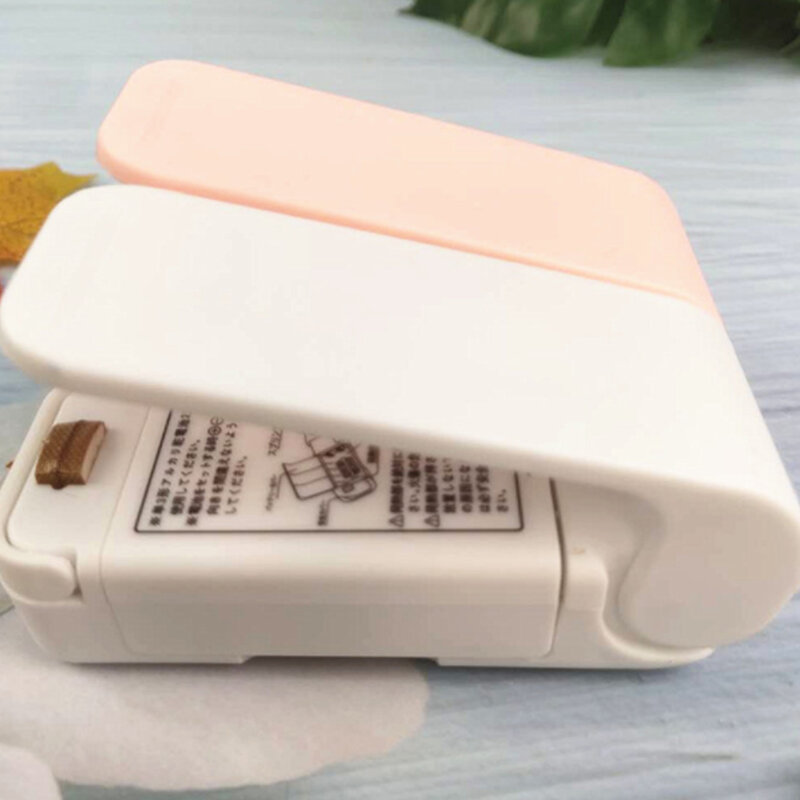 Mini máquina seladora de calor portátil Acessórios domésticos Saver de comida de cozinha Armazenamento de lanches frescos Saco de plástico