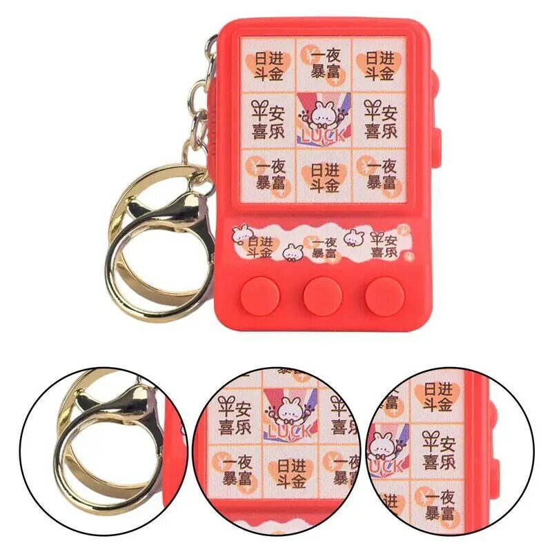 Creative Small Rolling Glowing Award Machine Toy Key Chain Mini Winning Childrens Game Pendant Keyfob for Wallets Backpacks