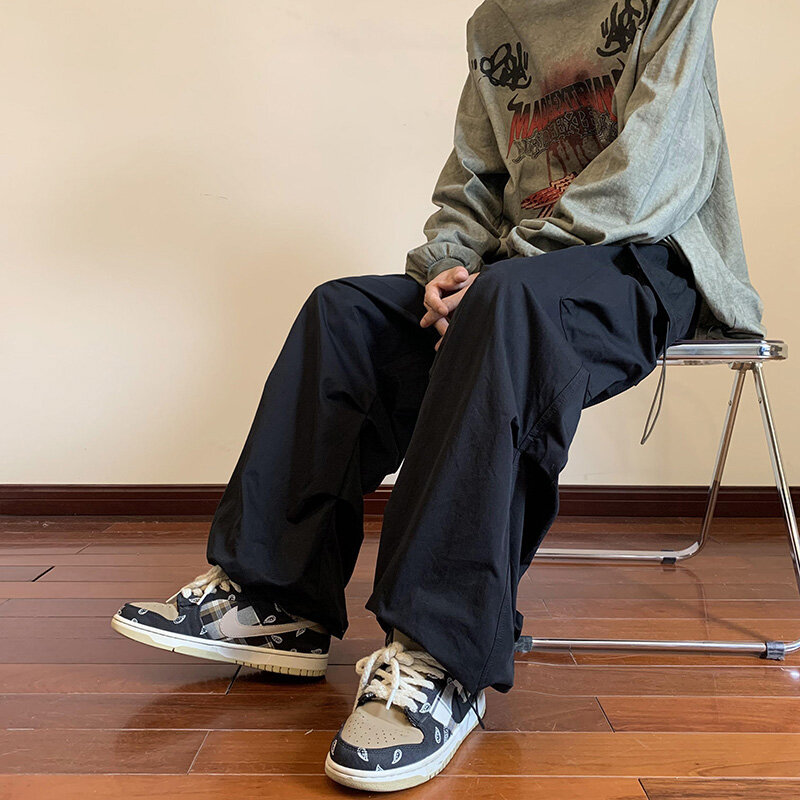 Pantalones Cargo para hombre y mujer, ropa de calle estilo Hip Hop con cintura elástica, longitud hasta el tobillo, estilo Harem, Harajuku, informal, con bolsillo, color negro