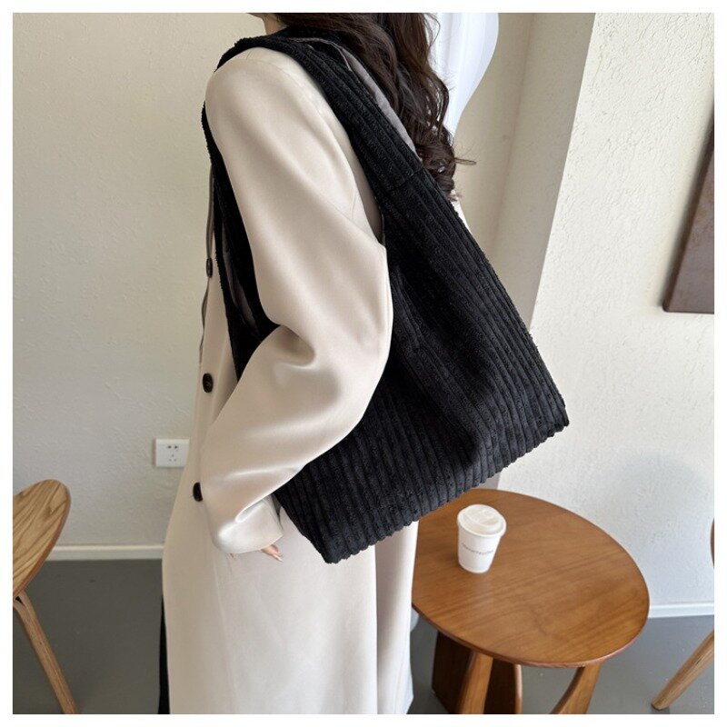 Bolso de hombro de gran capacidad de nicho Simple, bolso de hombro versátil de moda de invierno, bolso de diseñador de cubo, bolso de hombro femenino de lujo