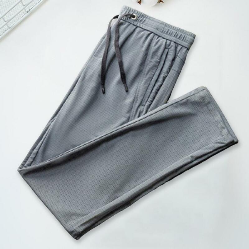 Men Sport Pants Solid Color Breathable Deep Crotch Loose Drawstring Ankle-banded Zipper Pockets Mesh Men Sweatpants Male Clothes