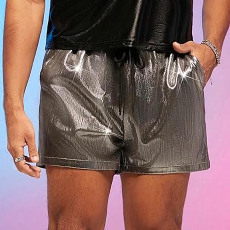 男性のルーズフィット光沢ショーツ、ヒップホップスタイル、伸縮性のある引きひもウエストポケット、夏