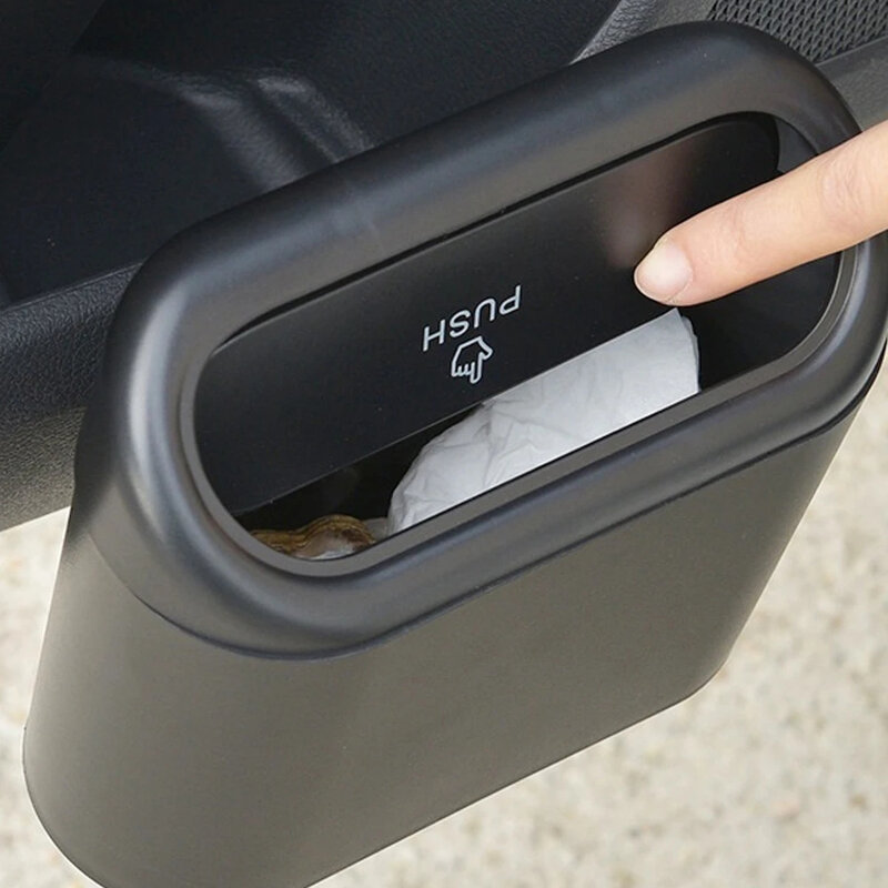 ถังขยะแบบแขวนในรถถังขยะแบบกล่องเหล็กของขวัญ ABS ถังขยะแบบกดสี่เหลี่ยมอุปกรณ์ตกแต่งภายในรถยนต์