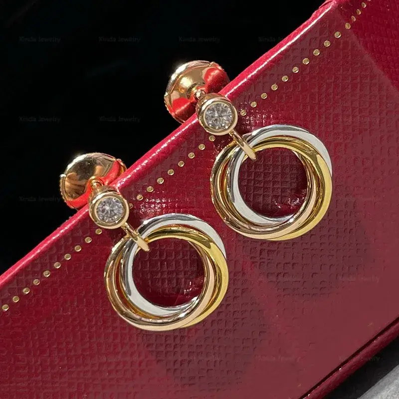 Proste i klasyczne okrągłe kolczyki damskie Trinity ze srebra próby 925 Elegancka marka modowa Luksusowa biżuteria imprezowa