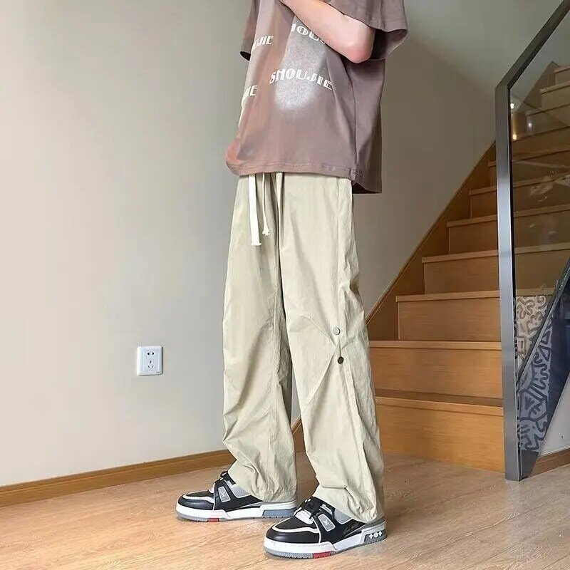 2024 wiosenne proste spodnie na co dzień dla mężczyzn z szerokimi nogawkami w jednolitym kolorze spodnie Cargo elastyczne w talii Harajuku męskie spodnie