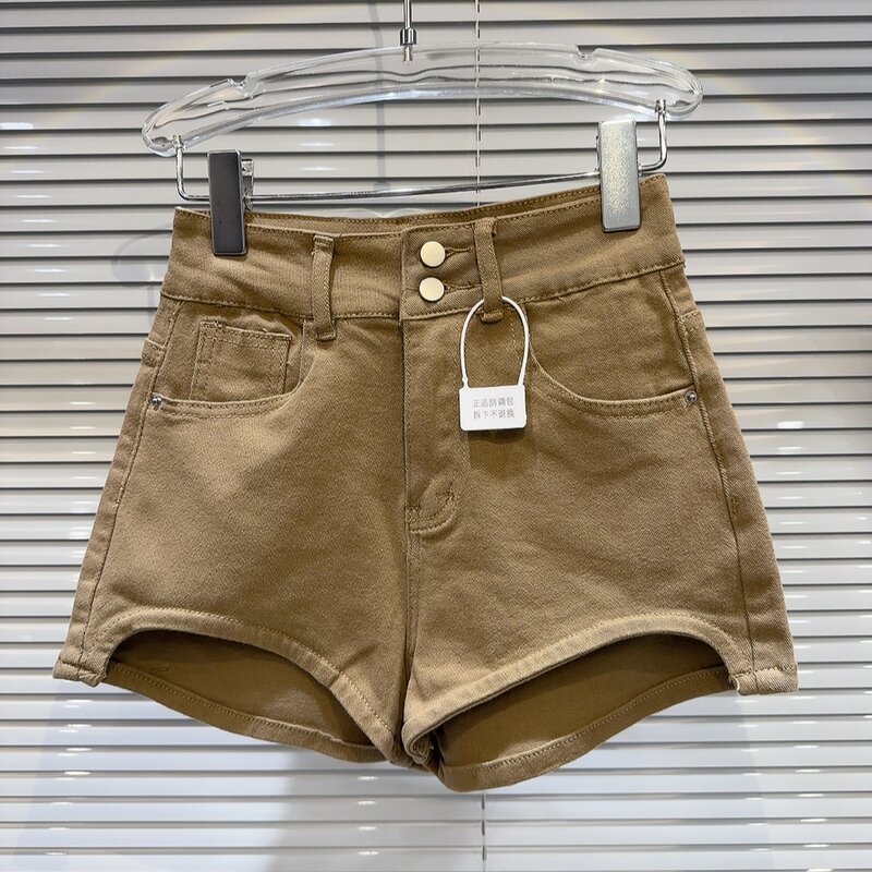 2024 Sommer neue amerikanische Retro gebogene Hose Bein Design Gewürz Mädchen Dreiviertel-Denim Shorts Hot pants
