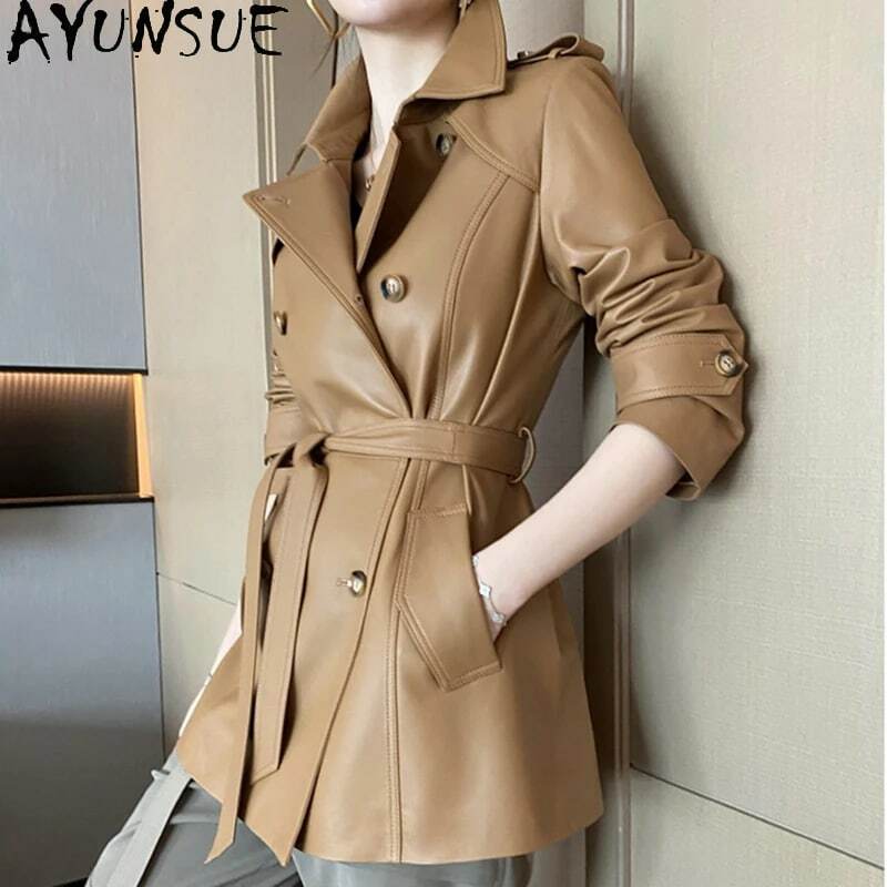 Yunsue-abrigo de piel de oveja para mujer, gabardina con cinturón de doble botonadura, cierre de cintura, longitud media, chaqueta de cuero genuino, moda de invierno