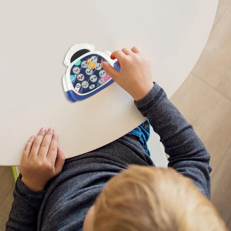 Juguetes Montessori para golpear para niños, consola de juegos portátil con forma de astronauta, máquina de Historia de educación temprana