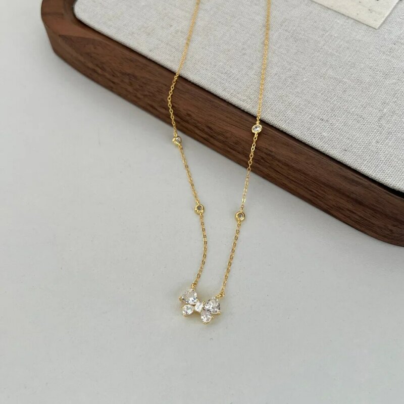 XUYUANFEN Korean Edition New S925 Sterling Silver Necklace Women's Bow with Zircon Inlay Symmetric and Fresh Design