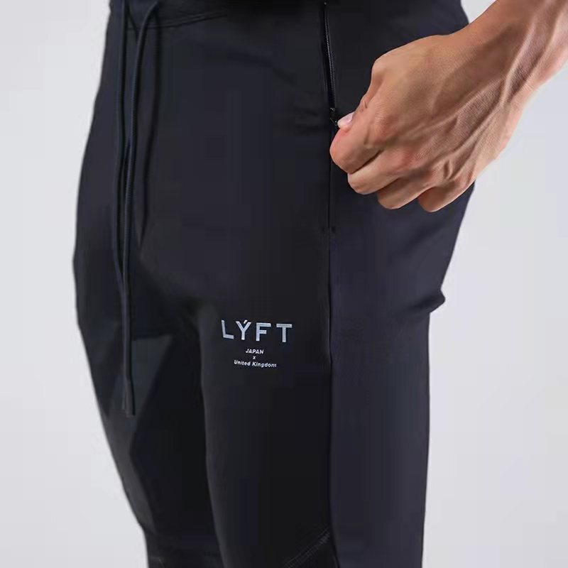 LYFT pantalones de Fitness para hombre, pantalones deportivos e informales transpirables, ajustados, con cremallera para pies pequeños, primavera y otoño, novedad