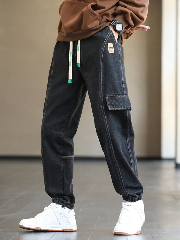 Plus rozmiar męski Cargo dżinsy joggery hiphopowy sweter fałszywe kieszenie rozciągnięte bawełniane casualowe spodnie jeansowe Baggy Jean spodnie 8XL