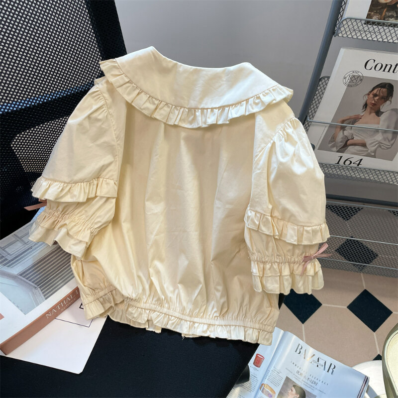 Francuskie bluzki w stylu Vintage słodkie Lolita Kawaii z marszczonych kokardkami kołnierz piotruś Pan z krótkim rękawem damskie letnie styl Preppy koszula z guzikami