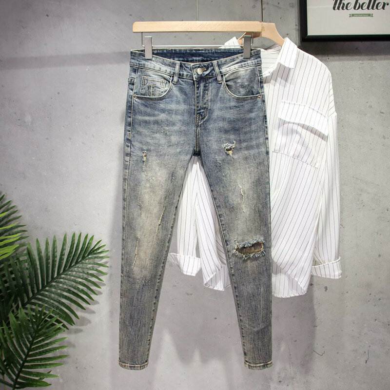 Celana Jeans Denim gaya Korea pria, celana Denim pensil ramping, celana desainer mode elastis Musim Semi dan Gugur