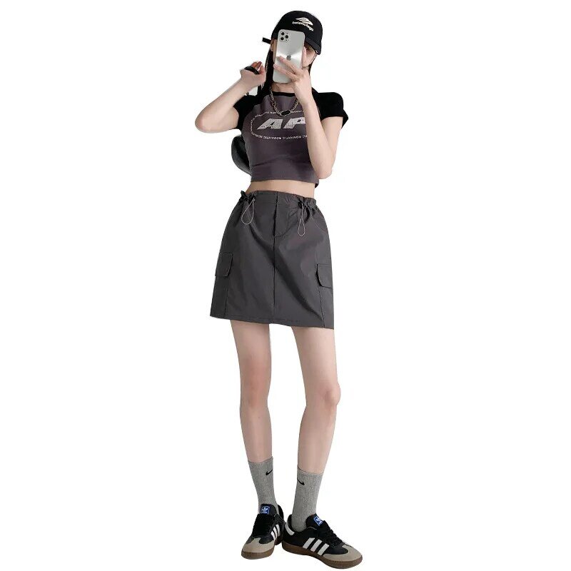 Jupe amincissante de style américain pour femmes, jupe trapèze décontractée, taille haute, conception de fouet, document solide, vêtements d'été, nouveau, 2024