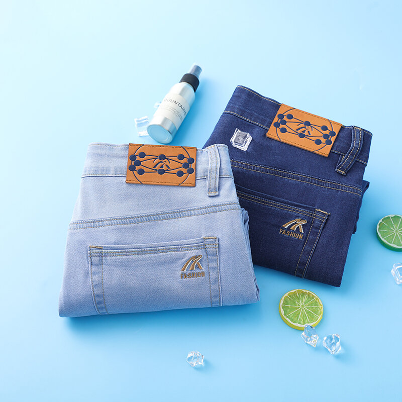 SHAN BAO letnie nowe męskie dopasowane proste cienkie oddychające jeansy klasyczne haftowane ubrania codzienne lekkie jeansy ze streczem