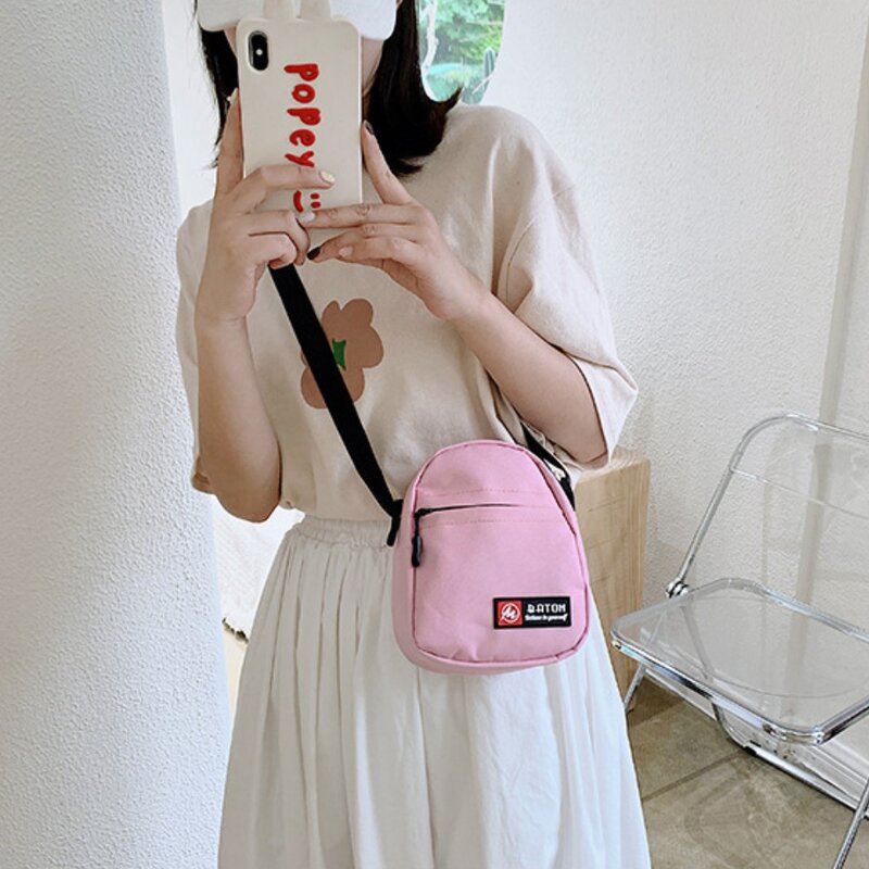 Bolsa tiracolo de lona feminina, mini bolsa de ombro versátil, bolsa tiracolo pequena, unissex, bolsa para celular, estudante, nova moda, 2024