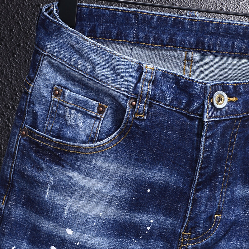 Streetwear moda masculina jeans retro azul elástico fino ajuste rasgado jeans pintados designer hip hop denim calças de lápis hombre