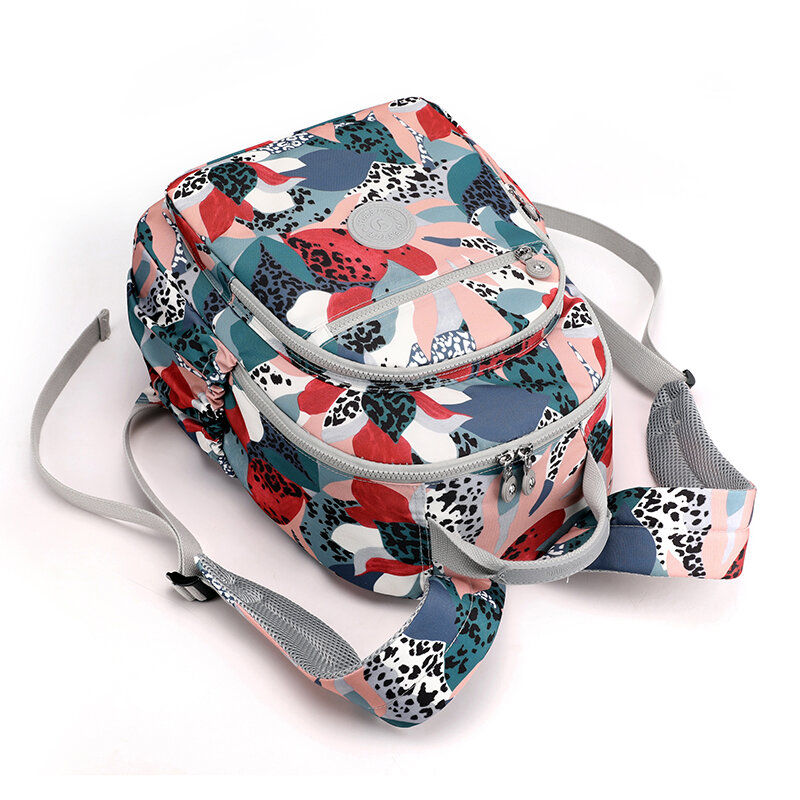 Petit sac à dos en nylon coloré pour femme, sac à dos à la mode pour fille, initié coréen, bandoulière, sacs de rangement de voyage pour femme, luxe, 2024