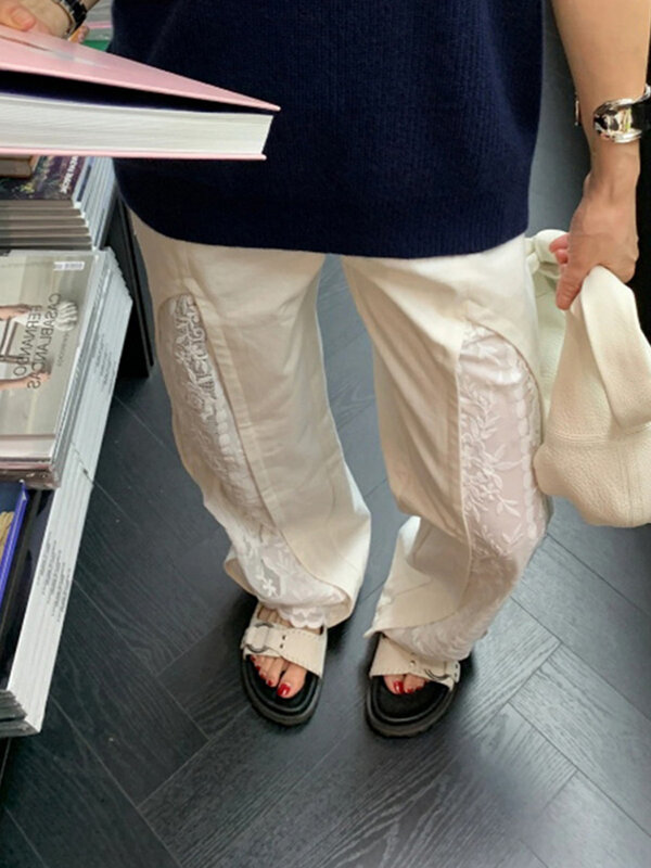 Celana panjang kaki lebar pinggang tinggi baru 2024 celana Denim wanita jahitan renda kerawang celana lurus longgar modis