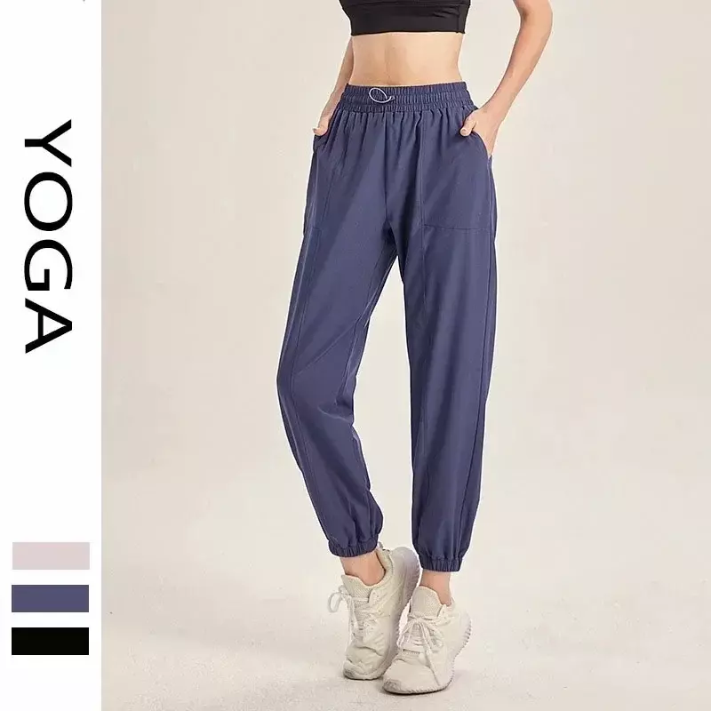 Celana Yoga longgar wanita, bawahan lari Fitness dengan saku, cepat kering