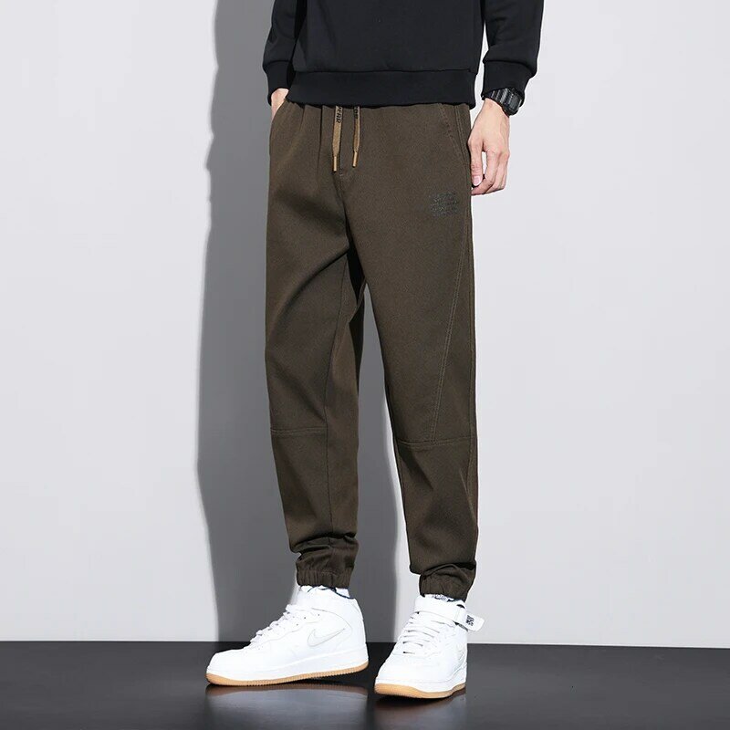2023 jesienno-zimowe spodnie na co dzień męskie w jednolitym kolorze elastyczny sznurek do ściągania talii spodnie gorsetowe do kostek sportowe codzienne spodnie męskie