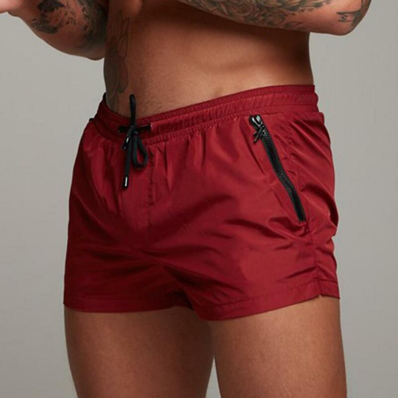 Shorts esportivos respiráveis masculinos com bolso com zíper, cordão, secagem rápida, ao ar livre, correndo, verão