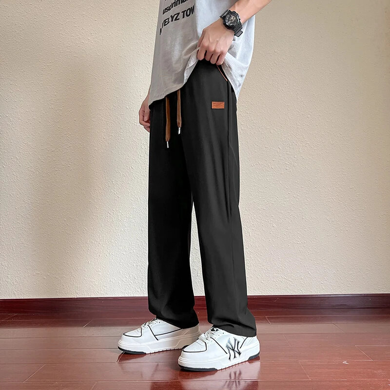 Celana panjang kargo untuk pria, celana panjang kasual gaya Korea lebar, celana Joger, celana kargo warna polos untuk pria 2024