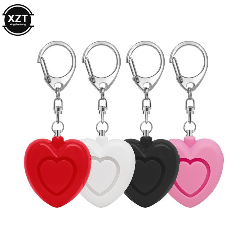 Female Portable Emergency Safety Alarm 130 DB Decibel with LED Light Safety Protection Key Chain Heart-shaped Anti Wolf Alarm