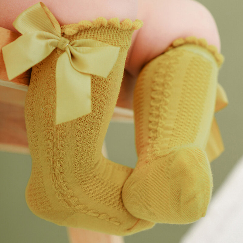 Calcetines largos de malla para niña pequeña, medias informales transpirables de Color sólido con lazo bonito, para primavera y verano