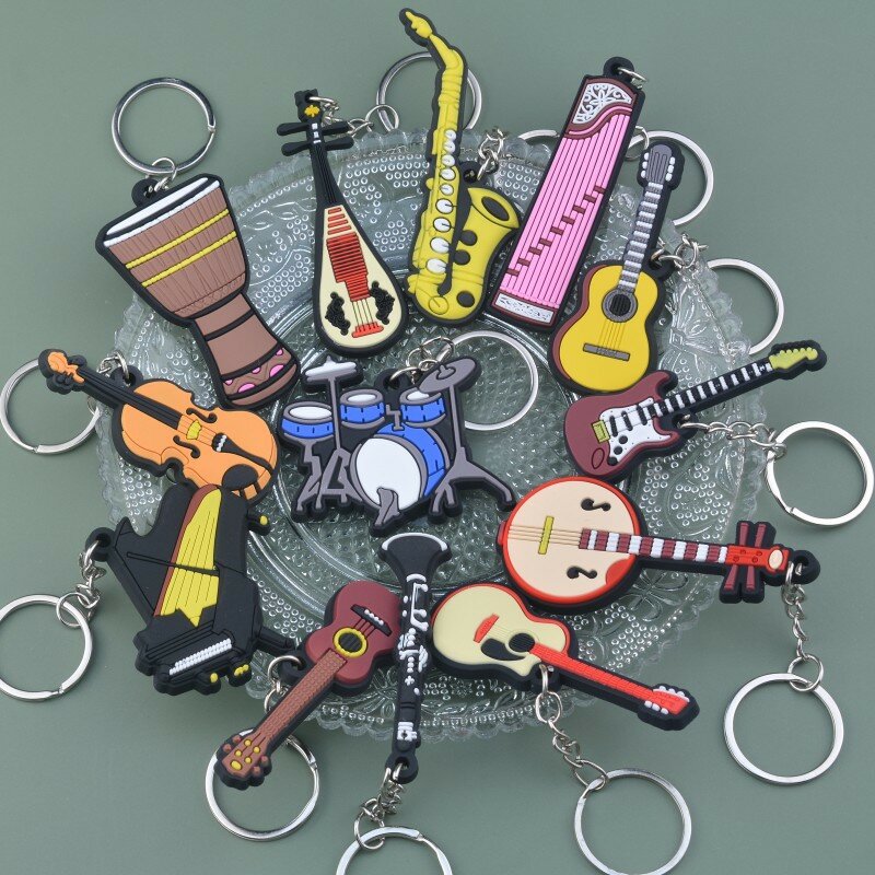 Porte-clés en silicone JESaxophone pour hommes et femmes, porte-clés de piano, pendentif de sac, porte-clés de voiture, cadeau d'amoureux de la musique, mignon