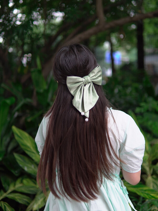 女の子のための弓付きの高品質のヘアピン,春のヘアクリップ,滑らかな色,ヘアアクセサリー