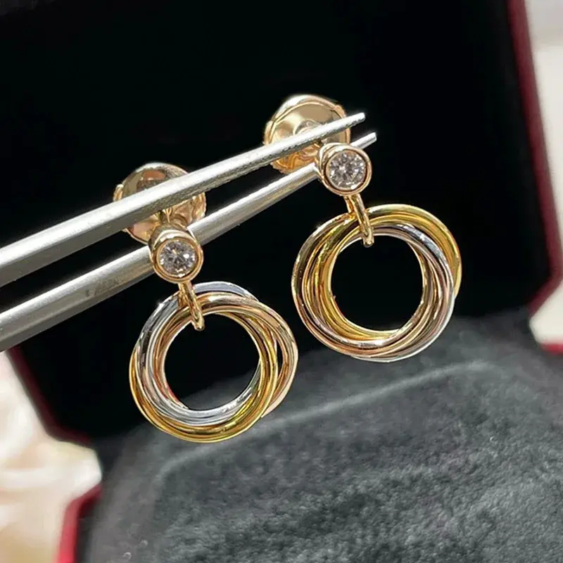 Proste i klasyczne okrągłe kolczyki damskie Trinity ze srebra próby 925 Elegancka marka modowa Luksusowa biżuteria imprezowa