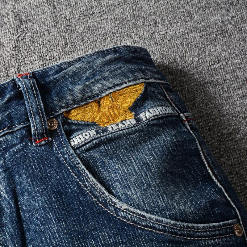 جينز رجالي بتصميم عتيق أنيق بنطلون جينز ممزق بفتحات مرنة باللون الأزرق مغسول بتصميم عتيق بنطلون دينم قطني للرجال
