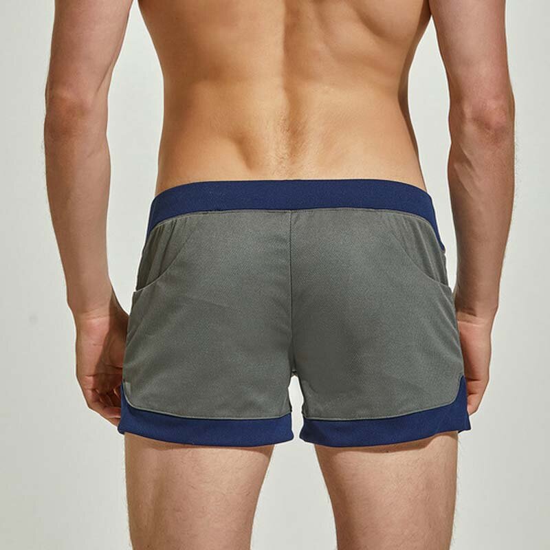 Pantalones cortos de Aro para hombre, ropa interior Sexy con bolsa para pene, cómoda y suelta