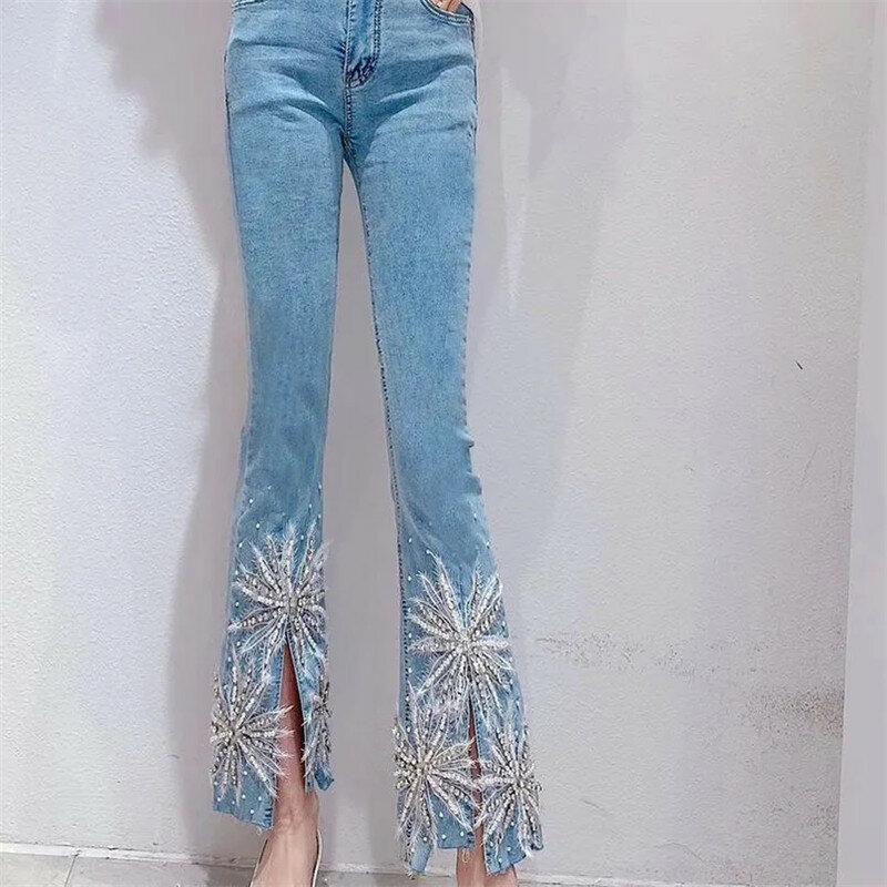 Abbigliamento femminile moda coreana squisiti Jeans con perline di strass donna elastico con spacco svasato a vita alta donna pantaloni in Denim da donna
