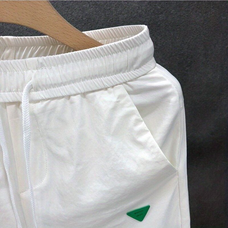 Новинка весна-лето 2024 модные Универсальные однотонные мужские свободные брюки до щиколотки с карманами и поясом на резинке