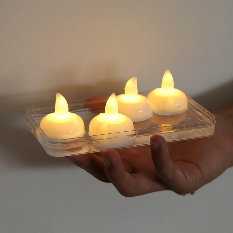 1 Set candele a luce di tè a LED senza fiamma lampada a candela a induzione bianca calda candele Tealight a batteria per la luce della candela del partito