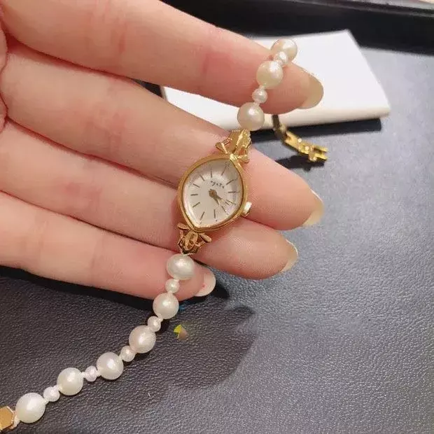 No fade 2024 new brass band  Japanese women's watch luxury retro natural freshwater pearl bracelet watch shell  quartz watch